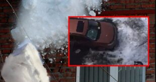 ВИДЕО: "Не повезло": в Киеве огромная глыба льда растрощила дорогой внедорожник, припаркованный под домом